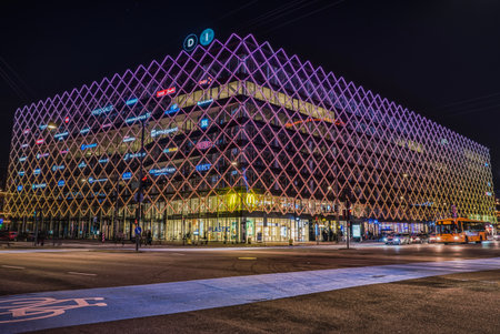 Copenhagen, Denmark - February 24, 2019The House of Industry (Industriens Hus) in the City Hall Square (Radhuspladsen) at night time with intense neon lighting on the facade conveys an urban styleのeditorial素材