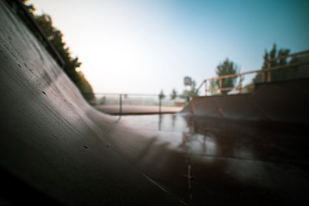 Skate ramp detail or skate half pipe on a gloomy, rainy day. Abandoned or forsaken skating halfpipe closeup in an apocalyptic cityscape or post apocalypse illustration. Bunkeflostrand, Swedenの写真素材