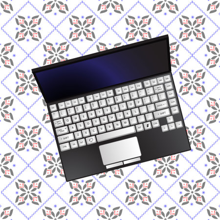 laptop over flowerish textureの写真素材
