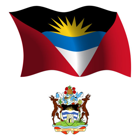 antigua and barbuda wavy flag and coat of arms against white background, vector art illustration, image contains transparencyのイラスト素材