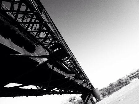 railroad tracks view from under the bridgeの素材