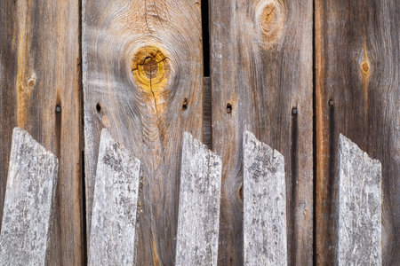 wooden fence, knot on the wooden wall of country houseの写真素材