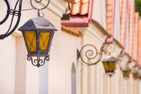 lamp hanging on the wall, antique buildings in Eastern Polandの写真素材