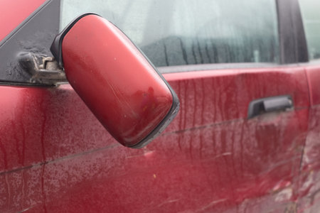 left car mirror broken, damagedの写真素材