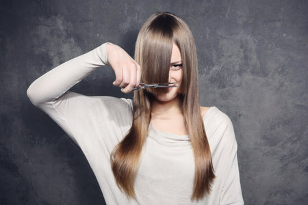 Lovely girl decided to get a haircutの写真素材