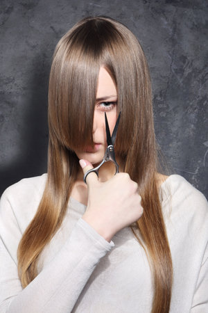 Lovely girl decided to get a haircutの写真素材