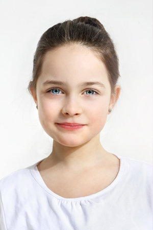 Blue-eyed girl on a white backgroundの写真素材