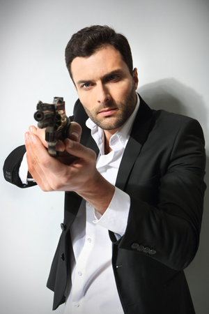 Man with a gun, isolatedの写真素材