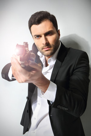Man with a gun, isolatedの写真素材