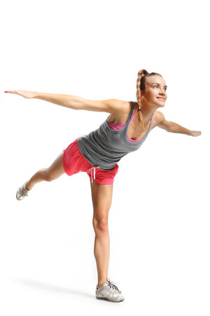 beautiful woman doing balance exercises swallowの写真素材