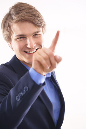 Portrait of a young worker in a blue suit の写真素材