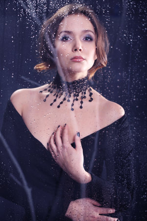 Glamour necklace-portrait of a woman in blackの写真素材