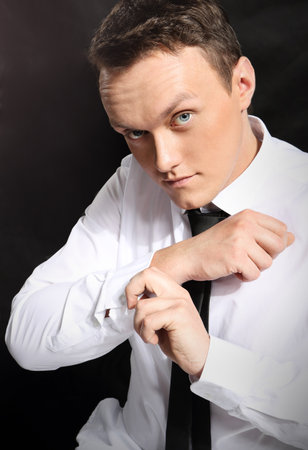 Portrait of smart young man zipped cuffs  の写真素材