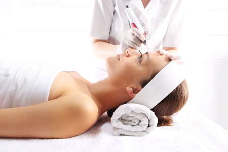 Rejuvenation, beautification, the woman at the beautician, Mesotherapy microneedleの写真素材