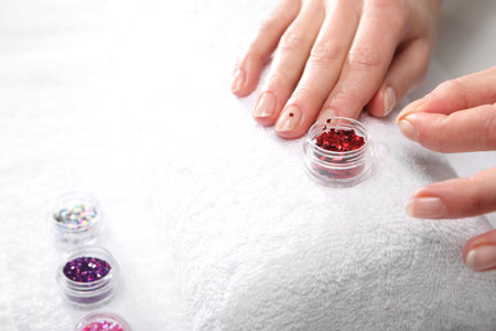 Beauty salon, manicure, a woman at the beauticianの写真素材