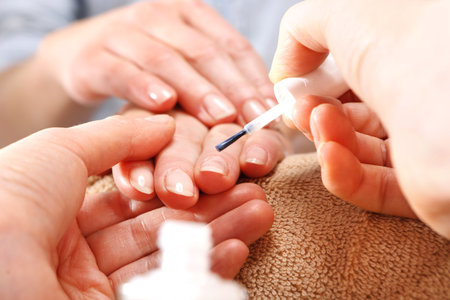 Nail Polish woman to a beauticianの写真素材