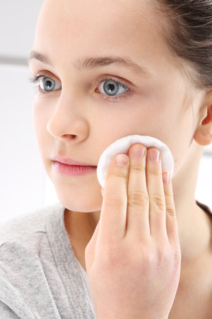 Teenager takes care of hygieneの写真素材