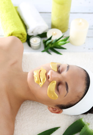 Gold mask, skin care around the eyes and mouth,の写真素材