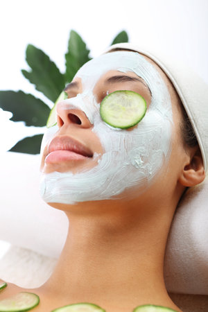 Facial mask, the woman at the beauticianの写真素材