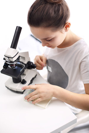 Girl with a microscopeの写真素材