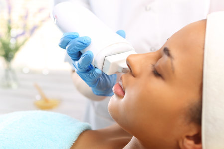 The woman\'s face during a facial at a beauty salon
の写真素材