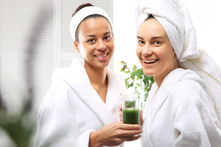 Friends in the spa salon, healthy diet, greenの写真素材