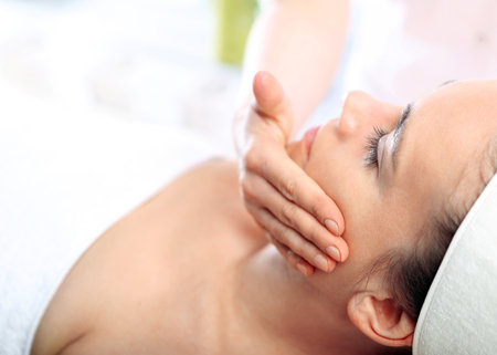 Spa and wellness relaxing facial massage Spa & wellnessの写真素材