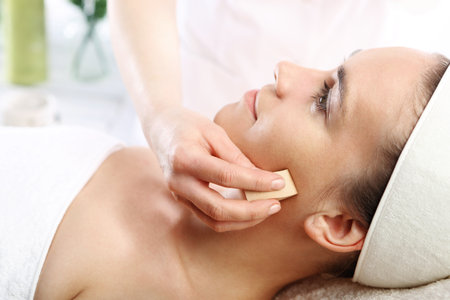 Spa and wellness relaxing facial massage Spa & wellnessの写真素材