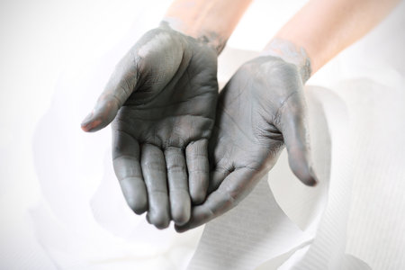 Hand massage. Women39s hands during surgery cosmetic hands with the applied mask with green clay.の写真素材