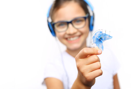 Child with orthodontic appliance.の写真素材