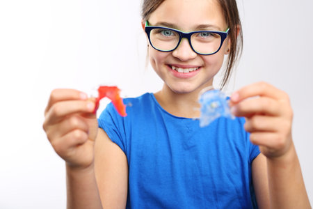 Child with orthodontic appliance.の写真素材