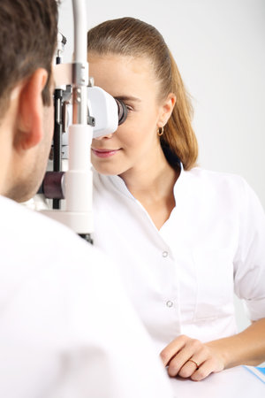 Computer vision test. The patient during an eye examination at the eye clinicの写真素材