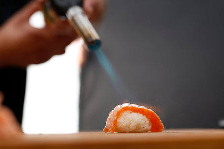Nigiri sushi with salmon burningの写真素材