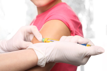 Diabetes in children - an injection of insulinの写真素材