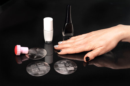 Stamps Applies the beautician nail lacquer on plaqueの写真素材