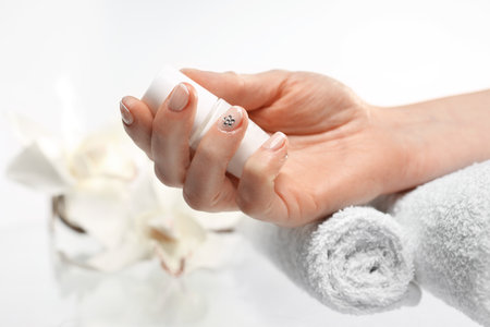 Hands woman during a manicure salonの写真素材