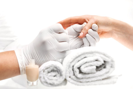 Beauty salon, manicure. Hands woman during a manicure salonの写真素材