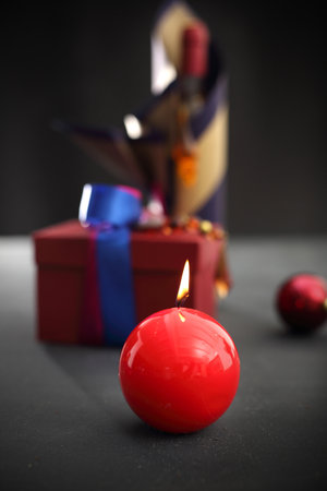 Red candle, festive atmosphere in the houseの写真素材