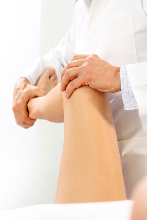 Rehabilitation. The doctor orthopedistの写真素材