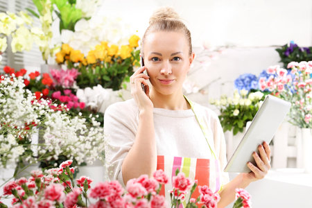 Flower Accepts telephone order for a bouquetの写真素材