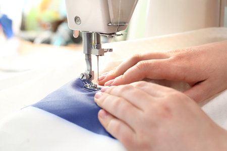 Sewing on a machine.の写真素材
