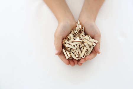 Wooden puzzle. Letters, educational puzzle.の写真素材