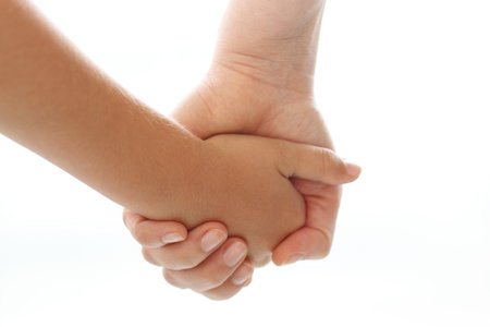 Mother holding a baby's hand.の写真素材