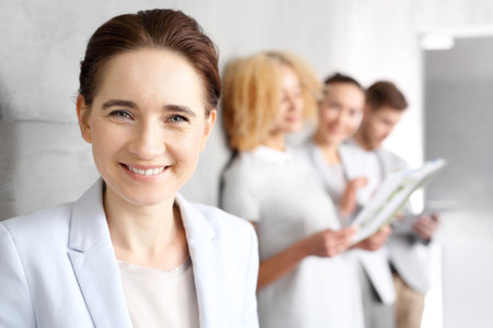 Success in business. The team of employees at the presentation of the company's strategy.の写真素材