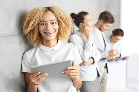 Job search.Woman waiting for an interview for a job in the officeの写真素材