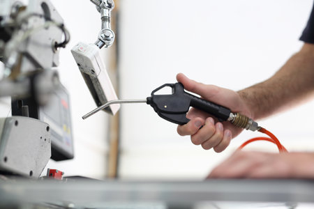 Cleaning machines compressor. The production plant, cleaning the sewing machineの写真素材