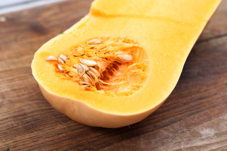 Butternut squash. Pumpkin on the kitchen counter.の写真素材