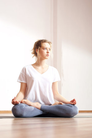 Yoga and meditation.Meditating woman is practicing yoga.の写真素材