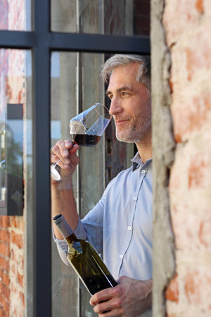 French wine. Man drinking wineの写真素材