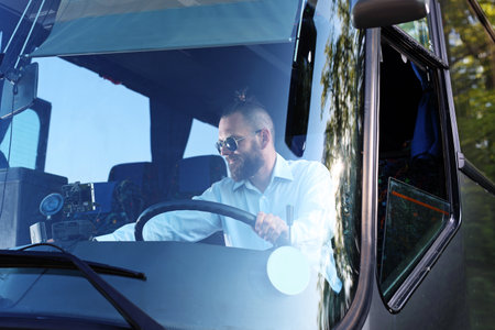 Bus driver A handsome bus driver in the bus